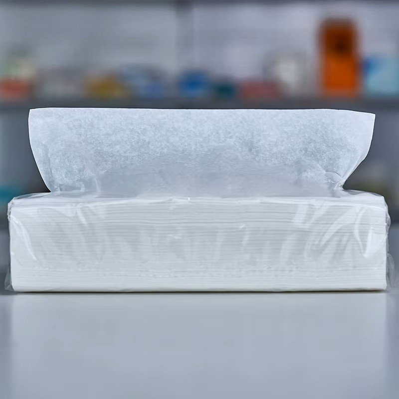 Shrink-wrapped pack of multifold hand towels with the top sheet pulled up