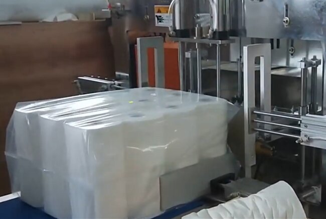 Perforating and rewinding large-format kitchen sheets
