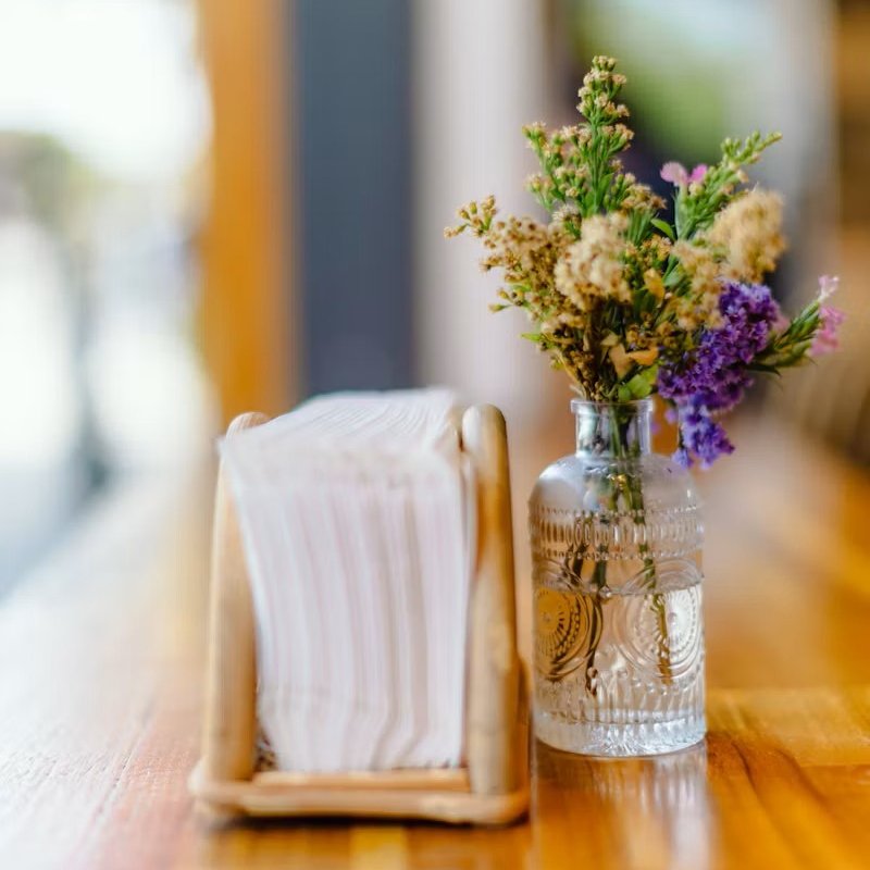 virgin wood pulp paper napkin on a restaurant table - Top Source Paper