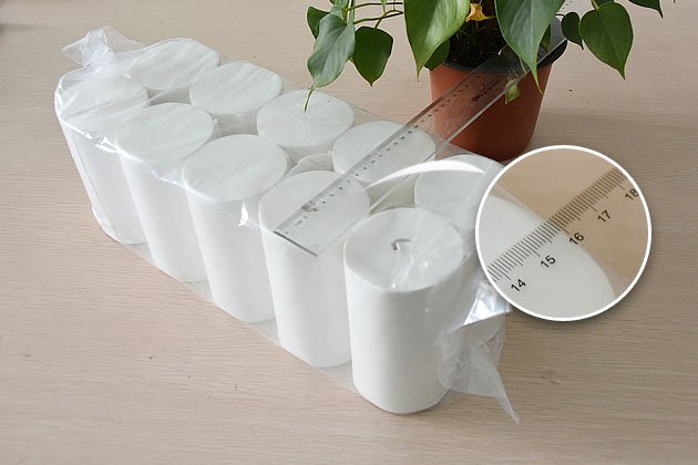 Edge embossing on virgin pulp bath tissue roll